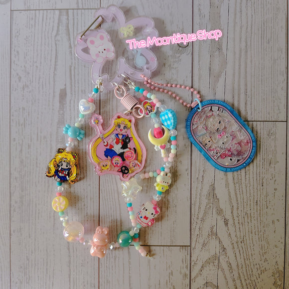 Handmade kawaii pastel beaded keychain with cute character charms, perfect for phone, bag, or keys.